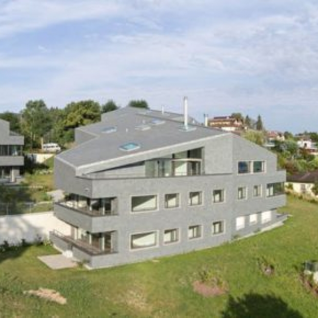 Domy jak skały -  głazy łupkowe z perspektywą